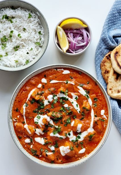 Butter Chicken served with Rice and Naan