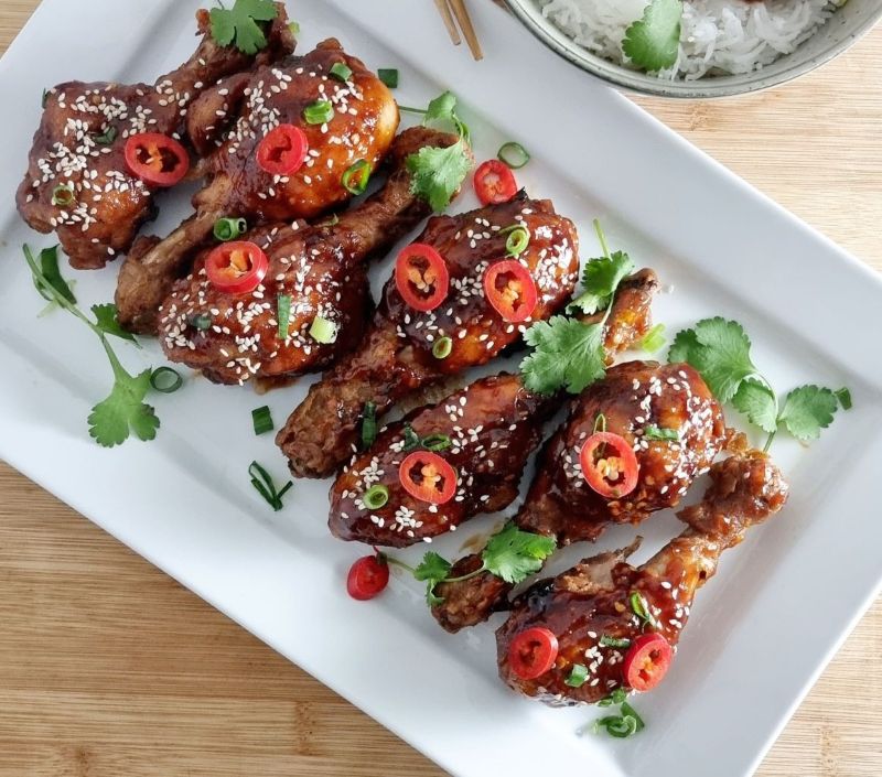 Crispy Sweet Chilli Chicken drumsticks in a platter