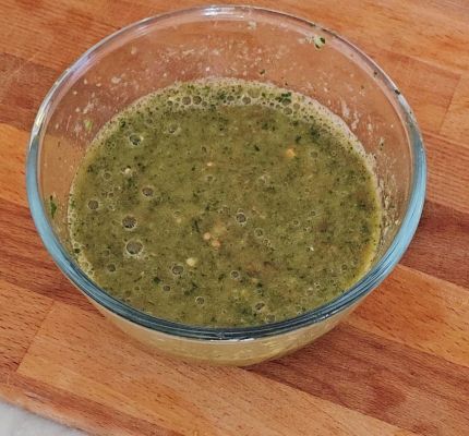 Fresh Afghan tomato chutney with garlic, green chilli, coriander, and lemon juice.