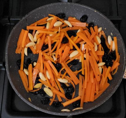 Carrots, raisins and almonds garnish for afghan pulao