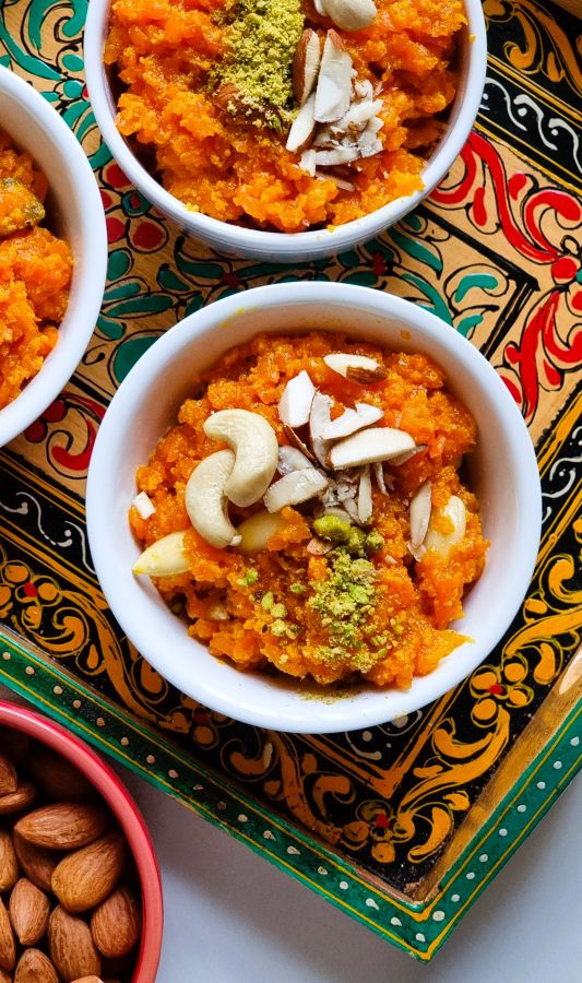 Carrot halwa topped with nuts