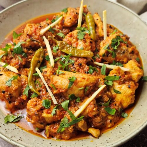 Achari chicken in a bowl
