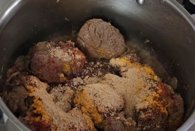 Turmeric, red chili powder, Kashmiri red chili, and ginger powder added to Nihari