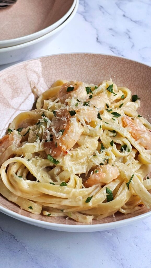 creamy garlic prawn pasta in a plate